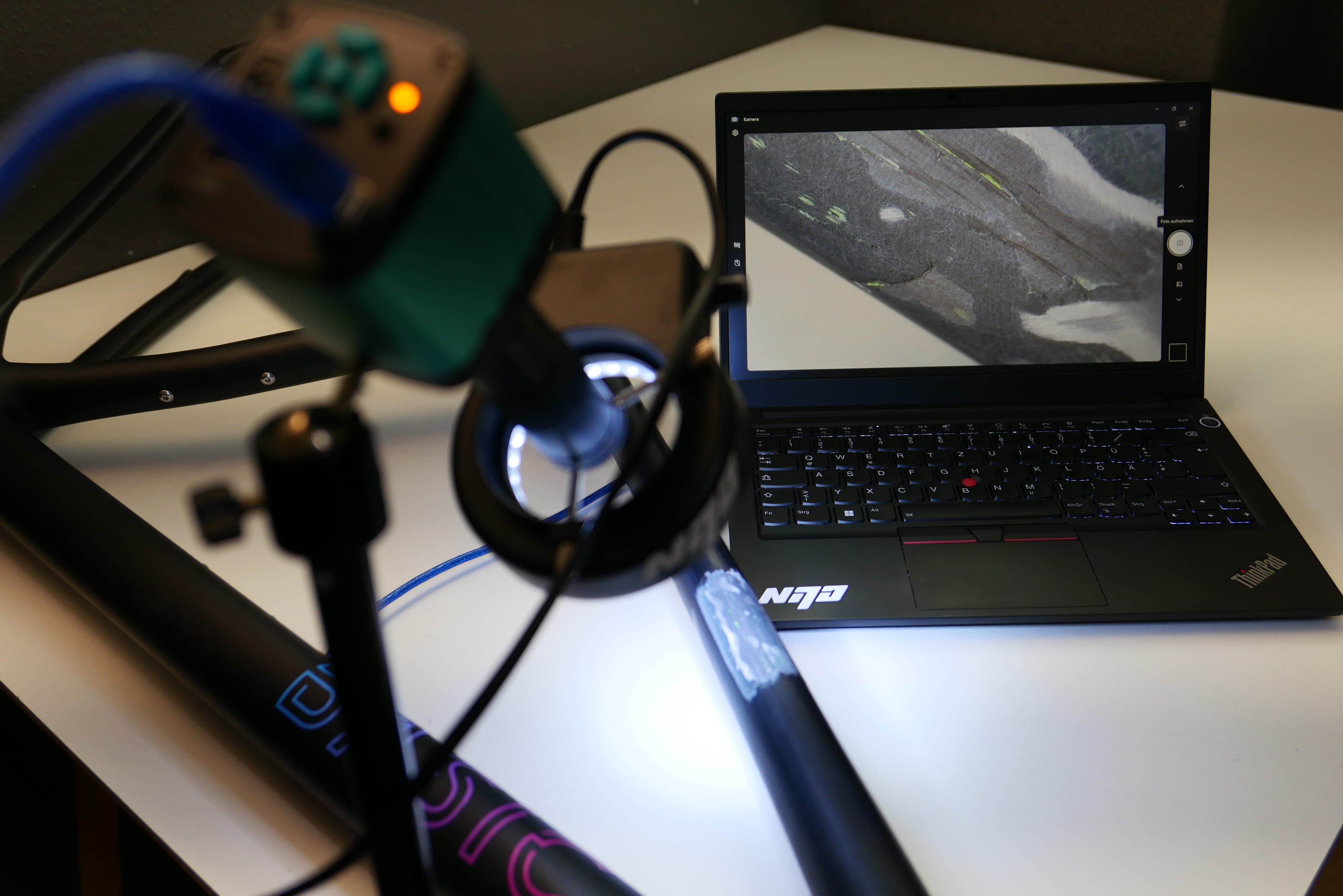 Identifikation und Nachweis von Einschnitten welche bis in die Carbon-Lagen hinein gelangen